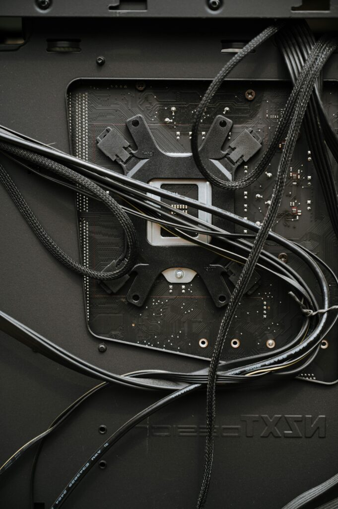 Detailed view of internal computer components and cables for maintenance or assembly.